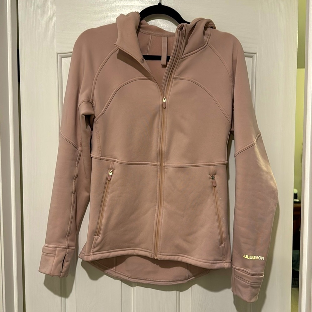 Lululemon hooded zip up jacket. Size 10 color pale pink